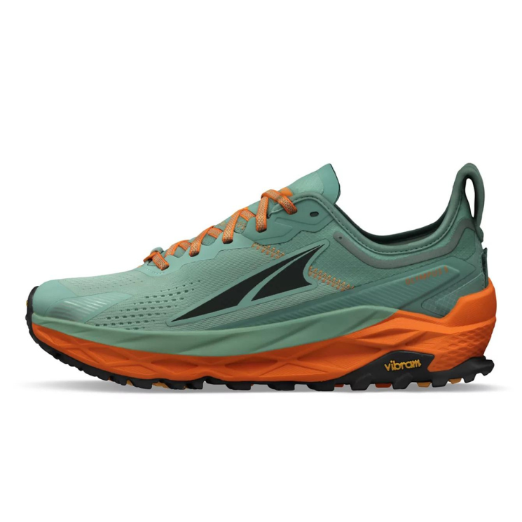A trail running shoe in sage green and orange, featuring a black Altra logo on the side, orange laces, and a thick orange midsole, shown against a plain white background.